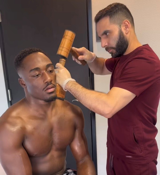 1Dr. Gamero in Hammer Therapy session with WBC Boxer Bakary Samake